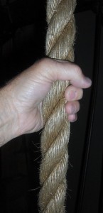 Elevator Rope 2518 Photo of hand around rope used to power a freight elevator