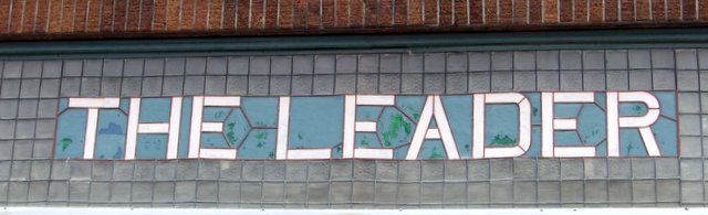 The Leader 2520 Photo of stained glass lettering over Leader store in Lime Springs, Iowa, USA