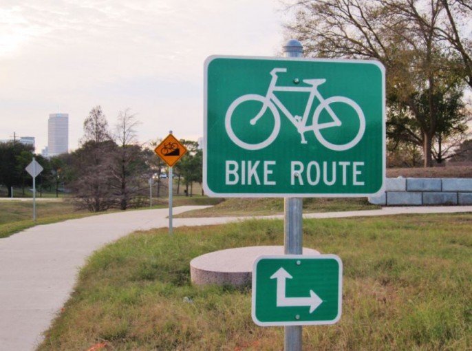 Photo of Bike Route sign, signifying simpler things.